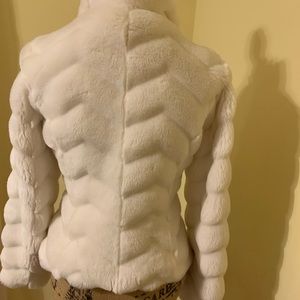 Cream fur coat from White House black market.